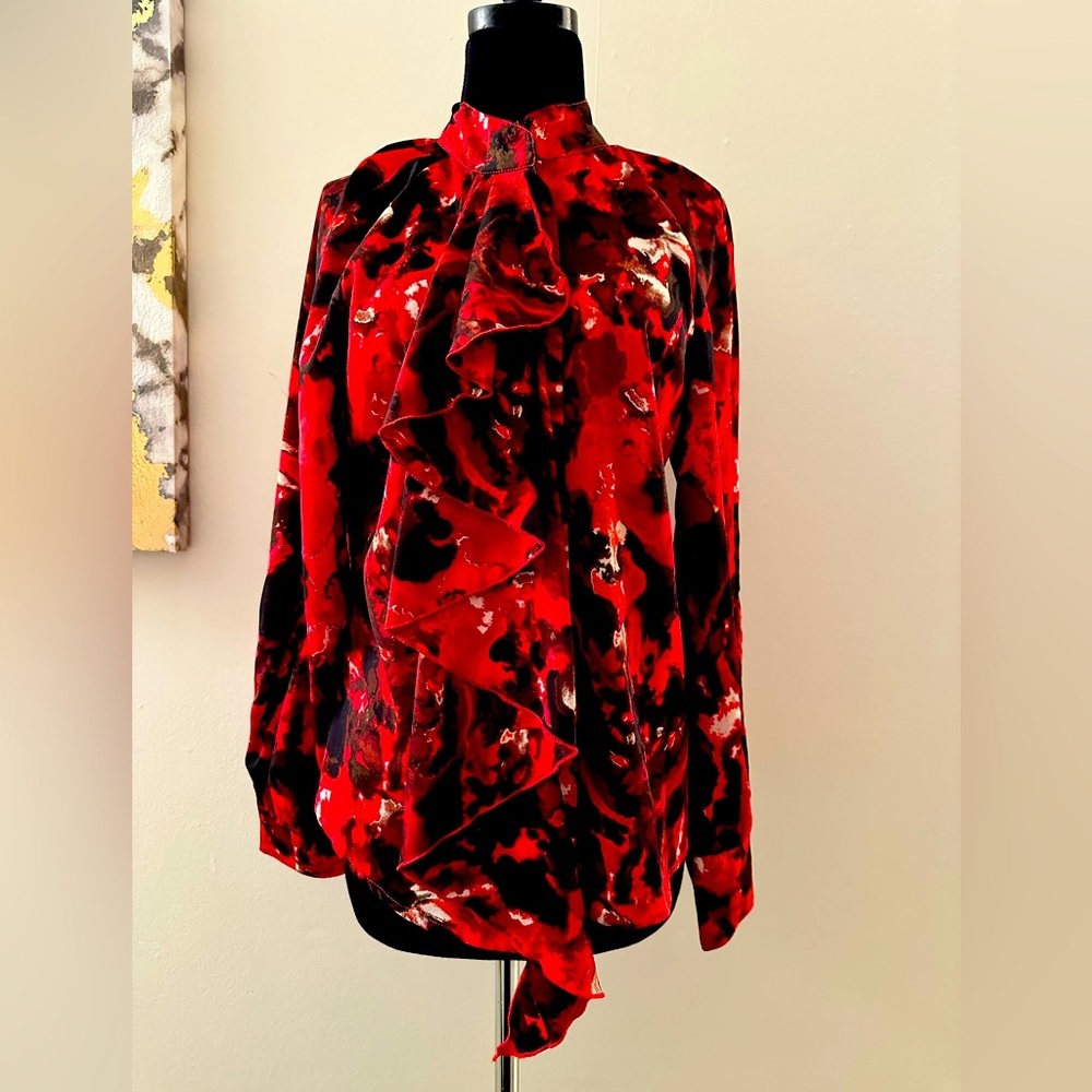 Women’s top size Large. Button up top. Frilly and fun!